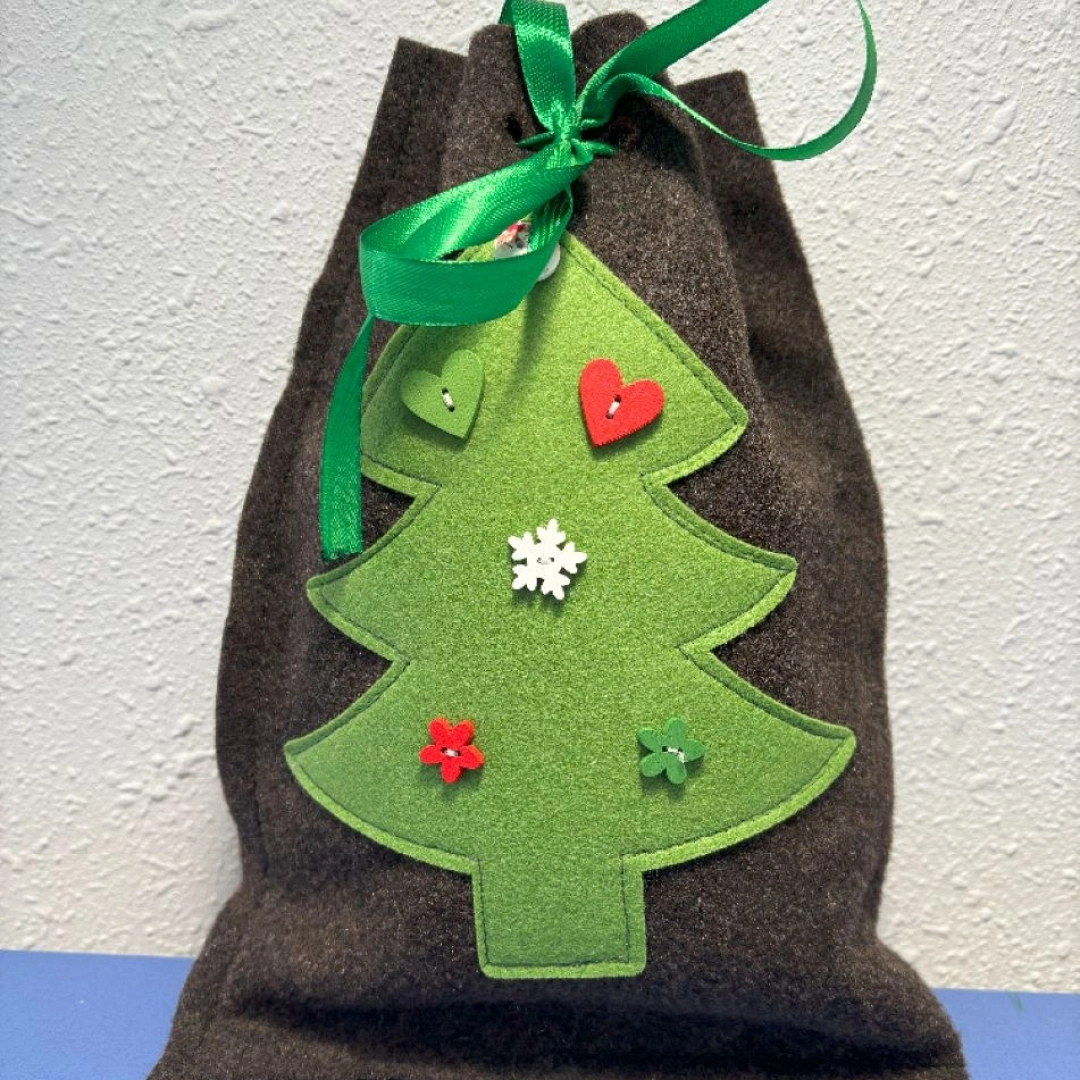 Taller infantil: Saquito de Olentzero en fieltro — Asociación de Vecinos de San Miguel, Irún